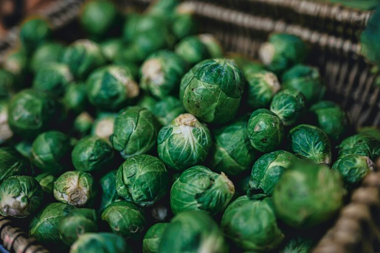 green leaves on brown woven basket Air Fryer Frozen Brussel Sprouts