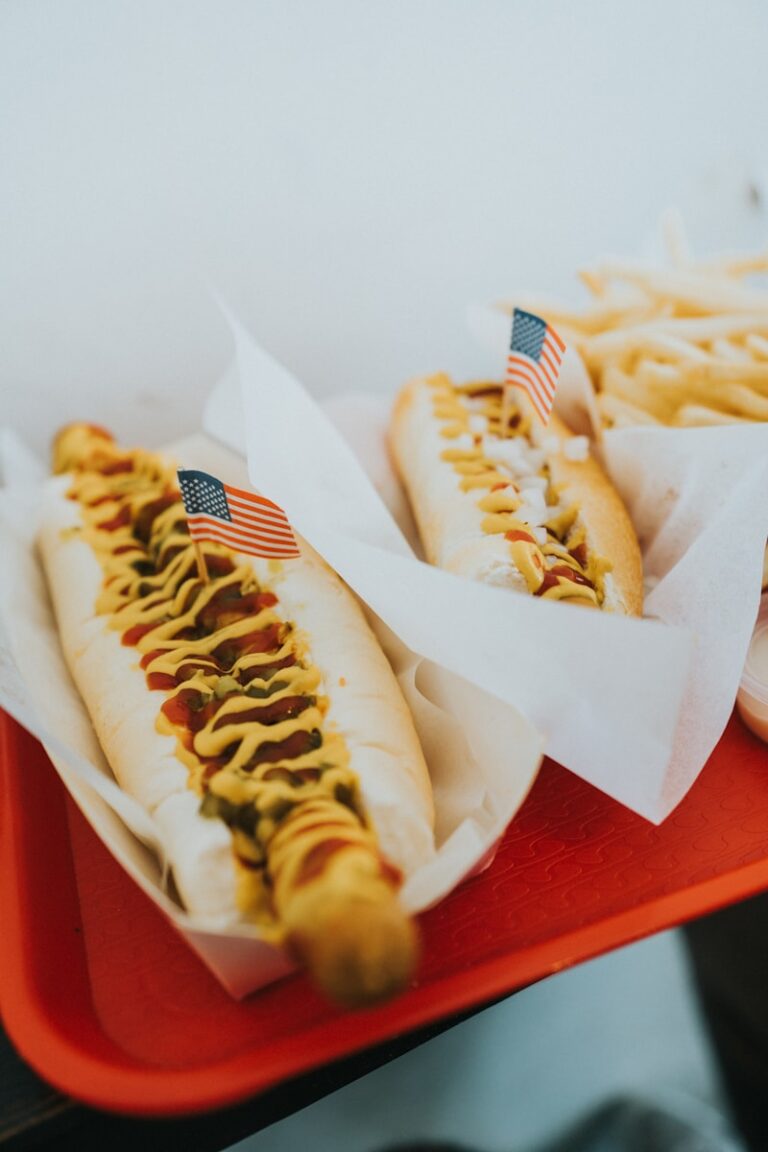 closeup photo of two hotdogs on tray air fryer sausage​